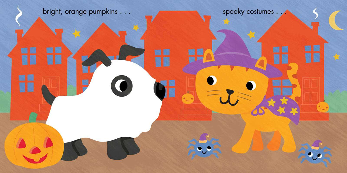 A cartoon dog and cat are dressed up for halloween.