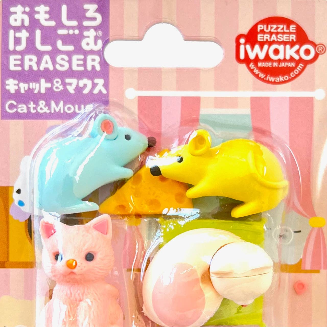 Packaged set of colorful puzzle erasers featuring a cat, mouse, and other animals on a pink background with iwako branding.