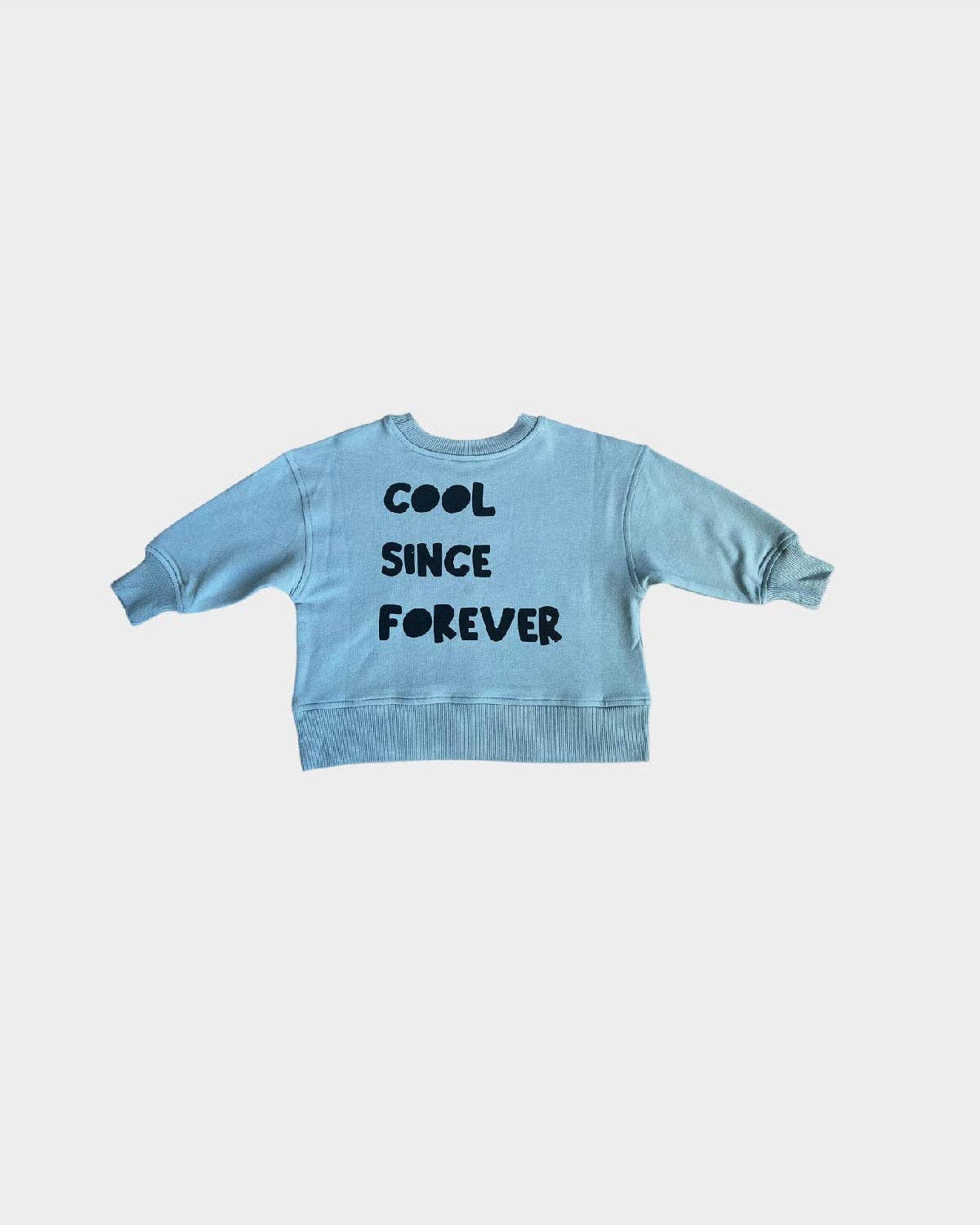 Black jersey sweatshirt with black text "Cool Since Forever" on a white background