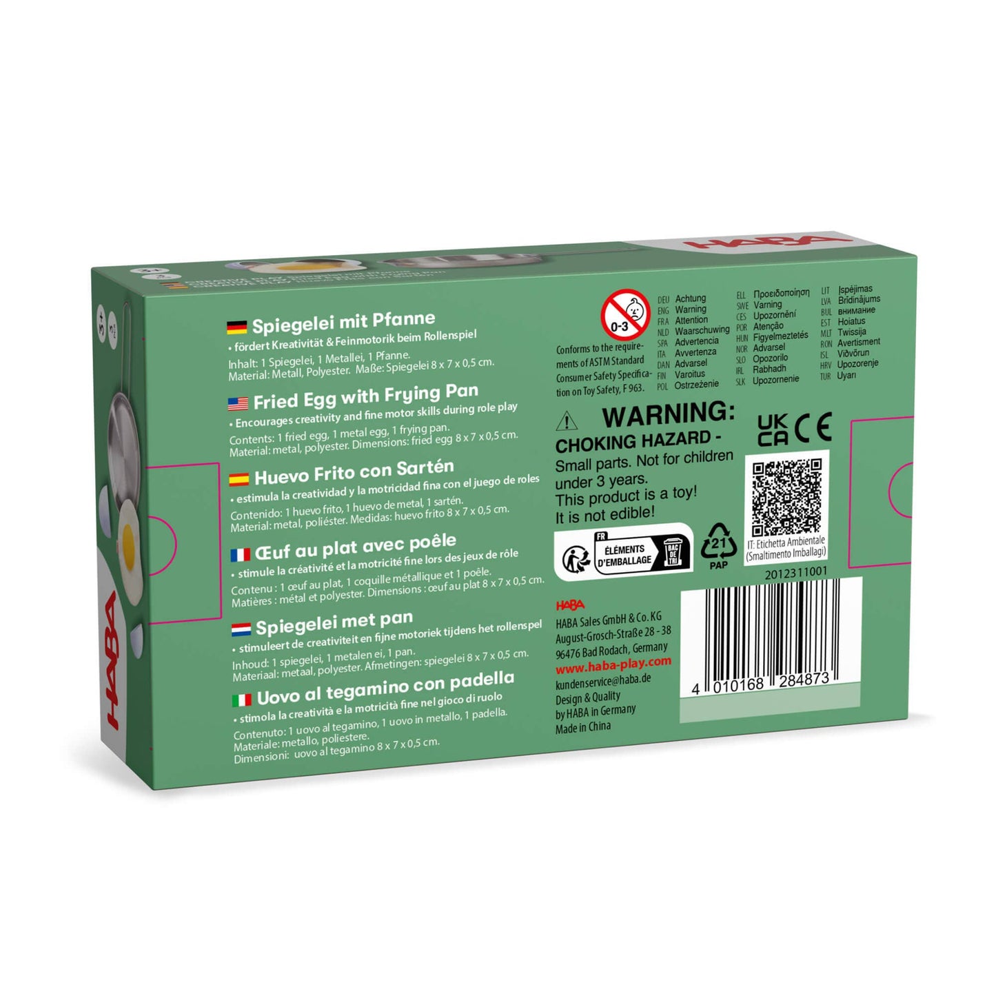 The back of a green cardboard box for Kaba brand 'Fried Egg with Frying Pan' (Spiegel ei mit Pfanne), showing product information, ingredients, warnings, and a barcode on a white background.