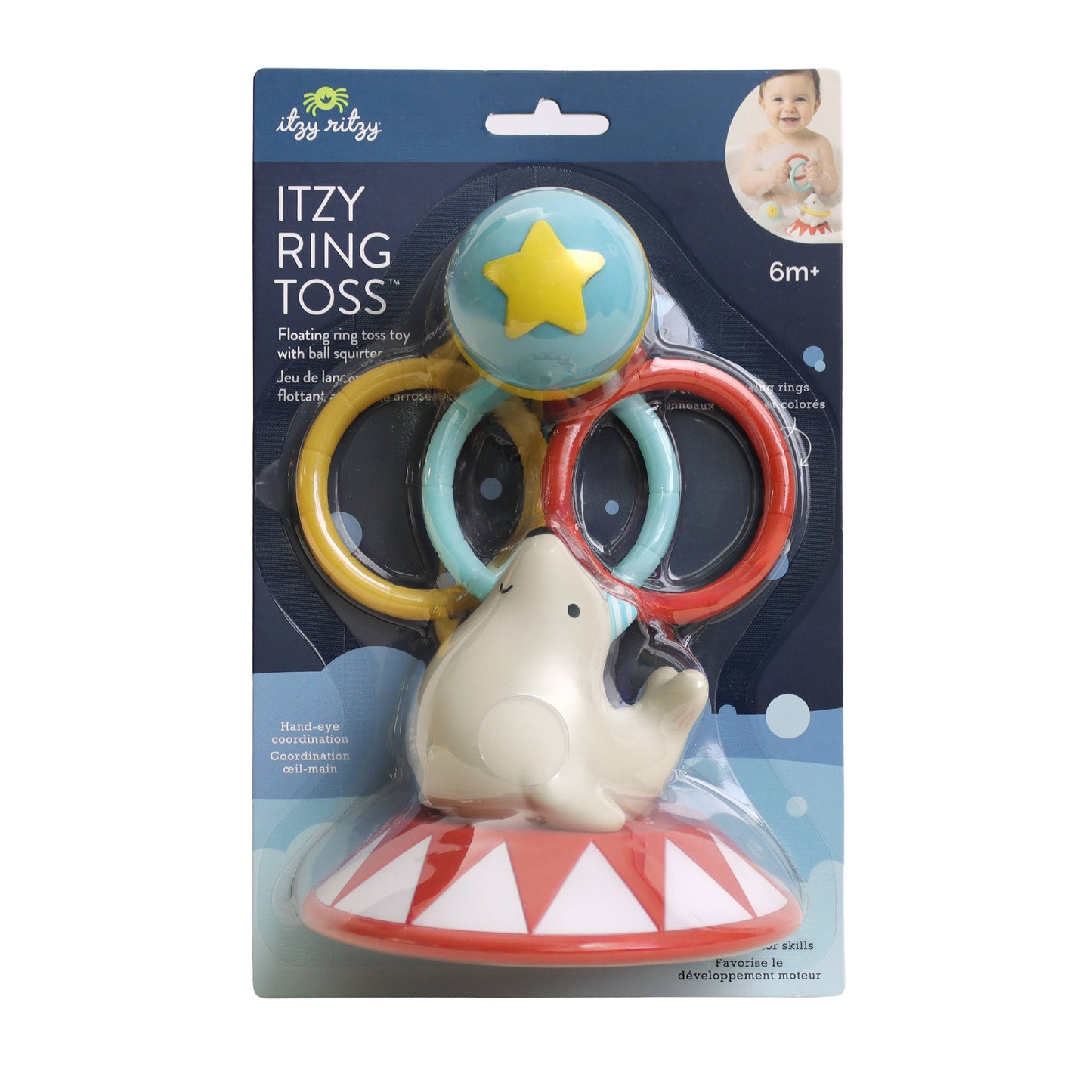 Itzy Ring Toss baby toy in its original retail packaging, featuring a plush elephant on a circus-themed base with three colorful rings and a ball to toss.