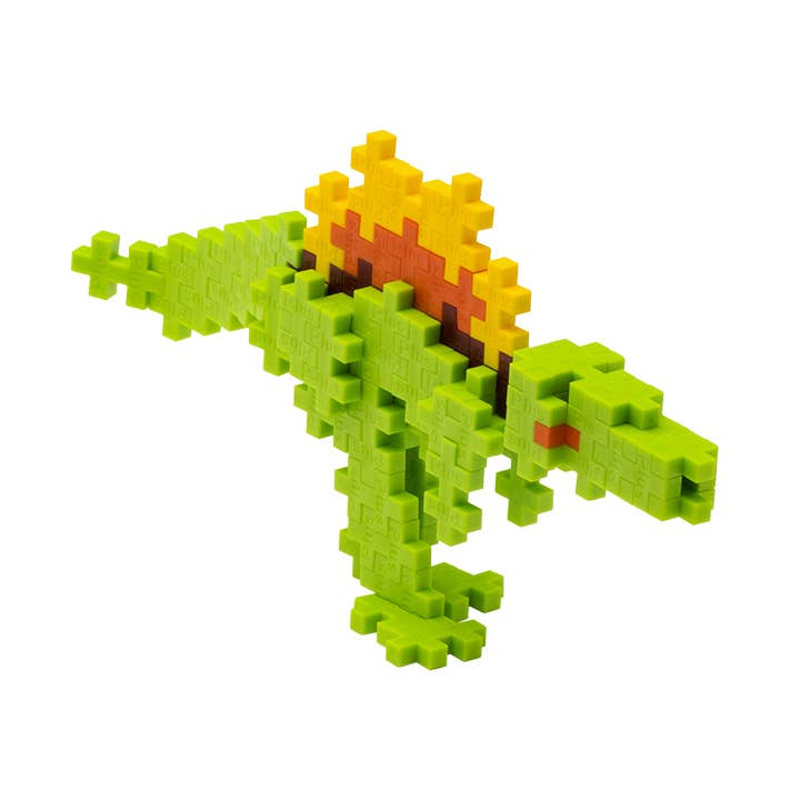 Dinosaur puzzle made of interlocking green and yellow blocks on a white background