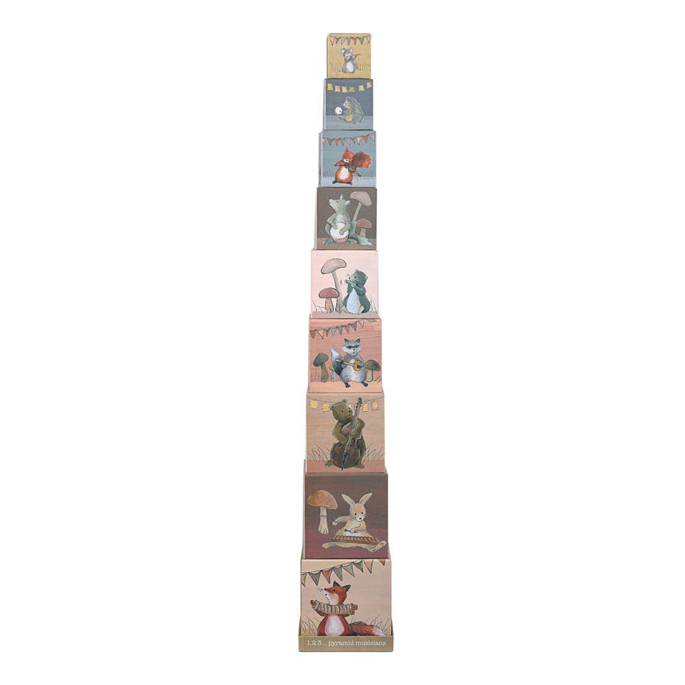 Stack of blocks with various illustrations on a white background