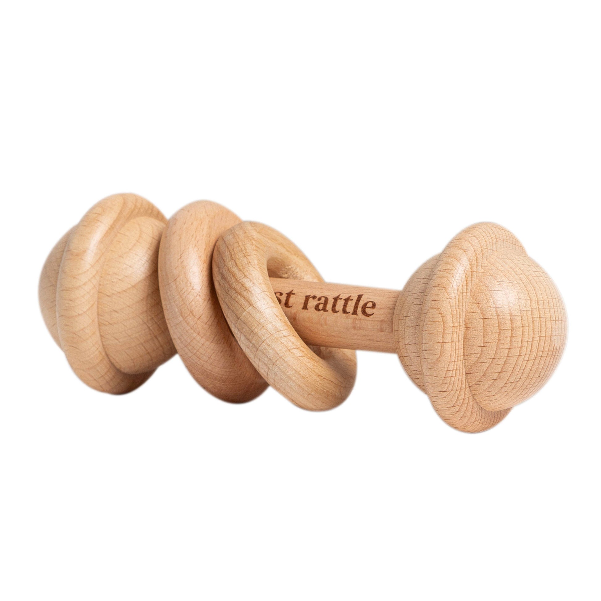 Wooden baby rattle on a white background