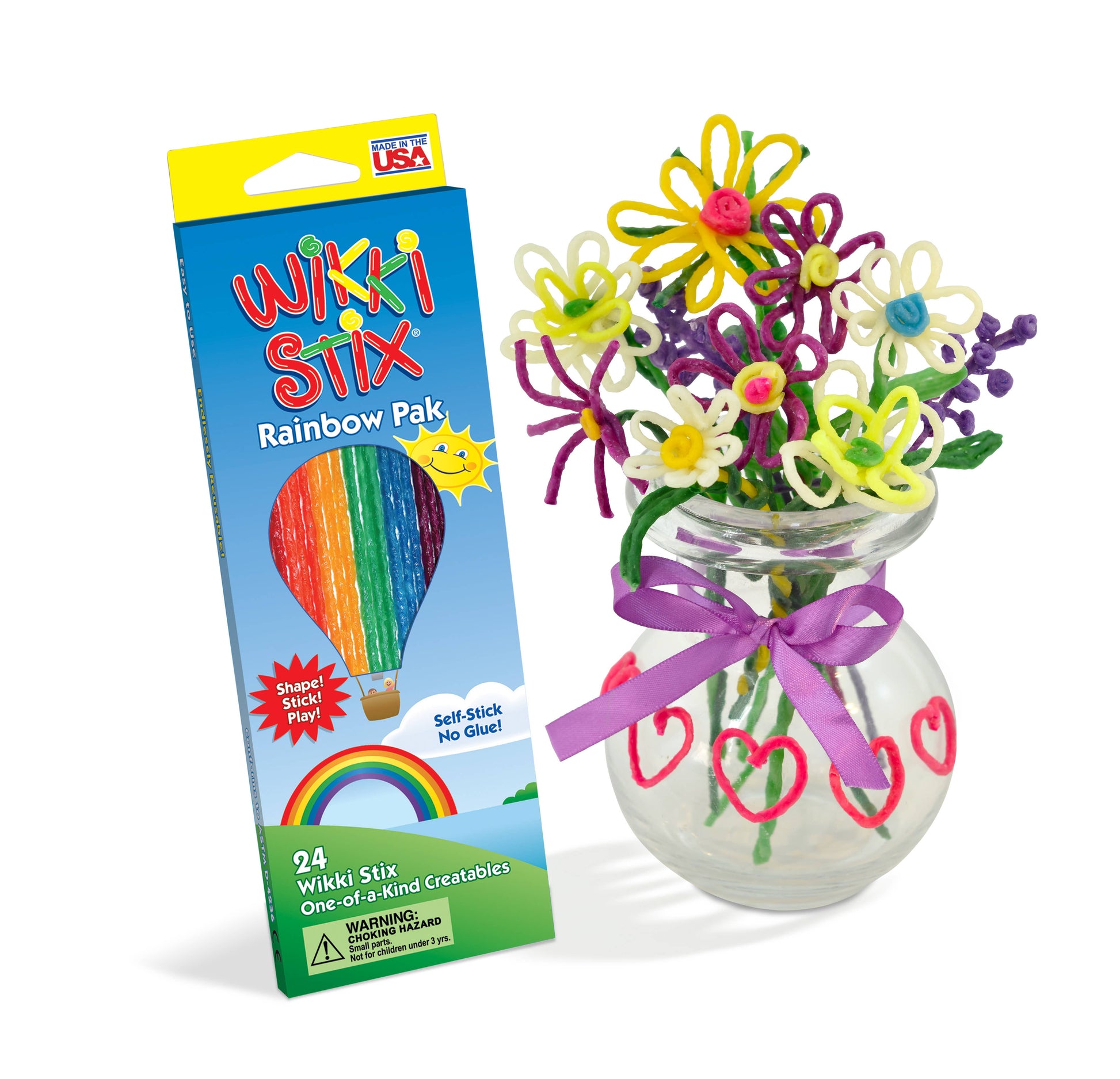 Wikki Stix Rainbow Pak with a jar of colorful flowers and a pink bow on a white background