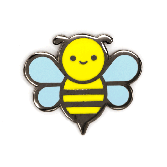 A cute cartoon bee enamel pin with a yellow face and striped body, light blue wings, and a silver metal border, shown on a plain white background.