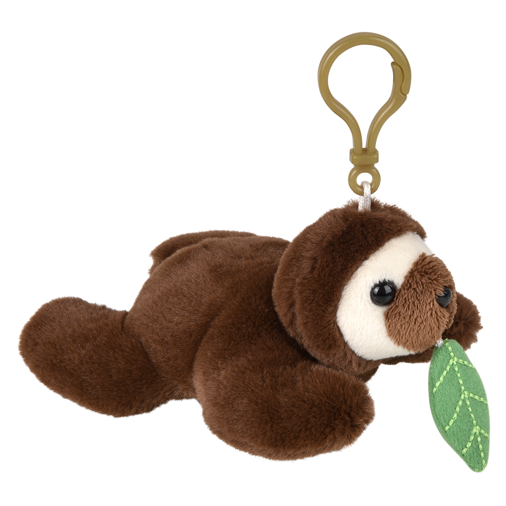 A plush sloth keychain toy in brown and white, holding a green leaf, attached to a brown plastic clip on a white background.