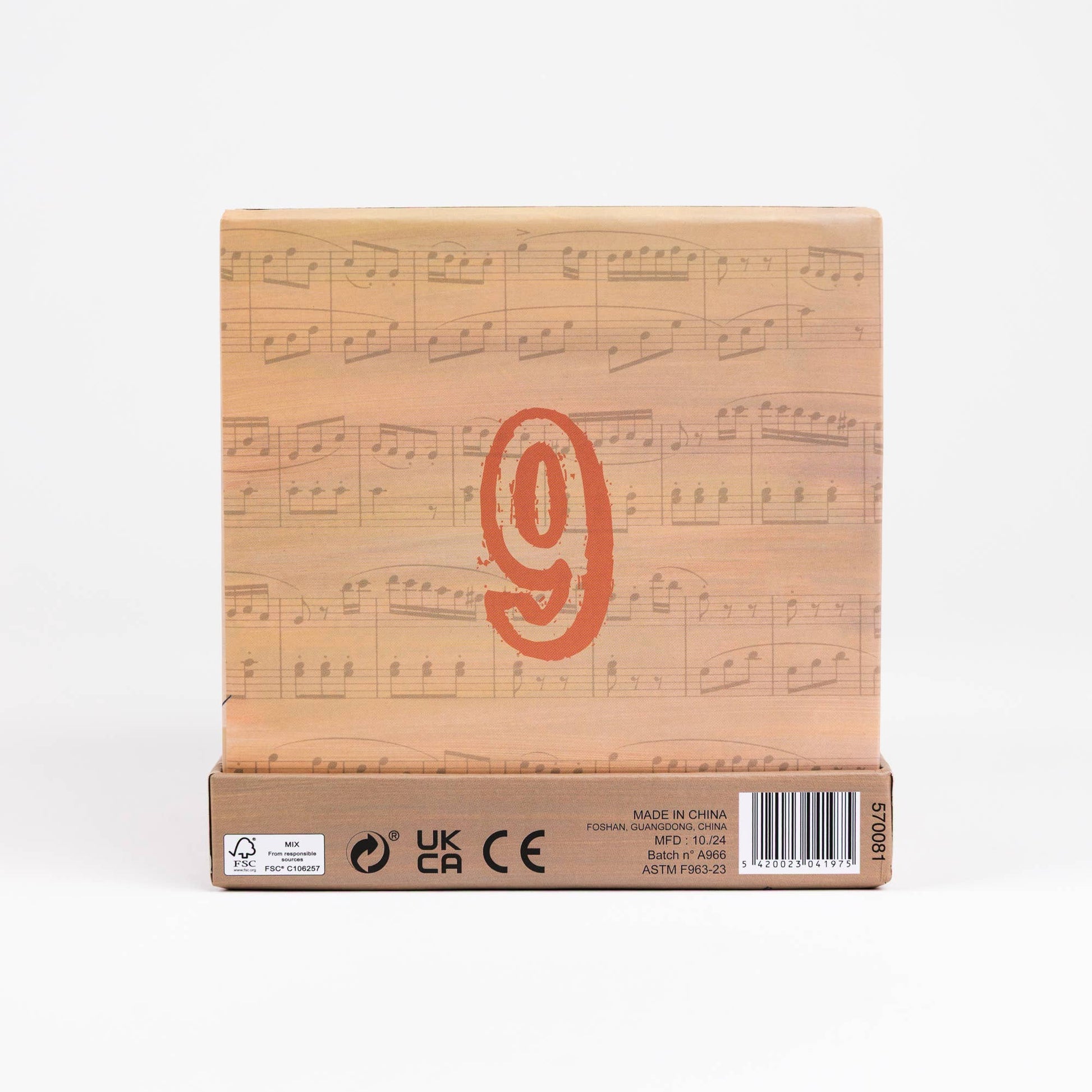 Coated paper block box with musical notes and a logo on a white background