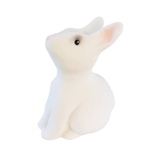 White rabbit-shaped coin bank on a white background