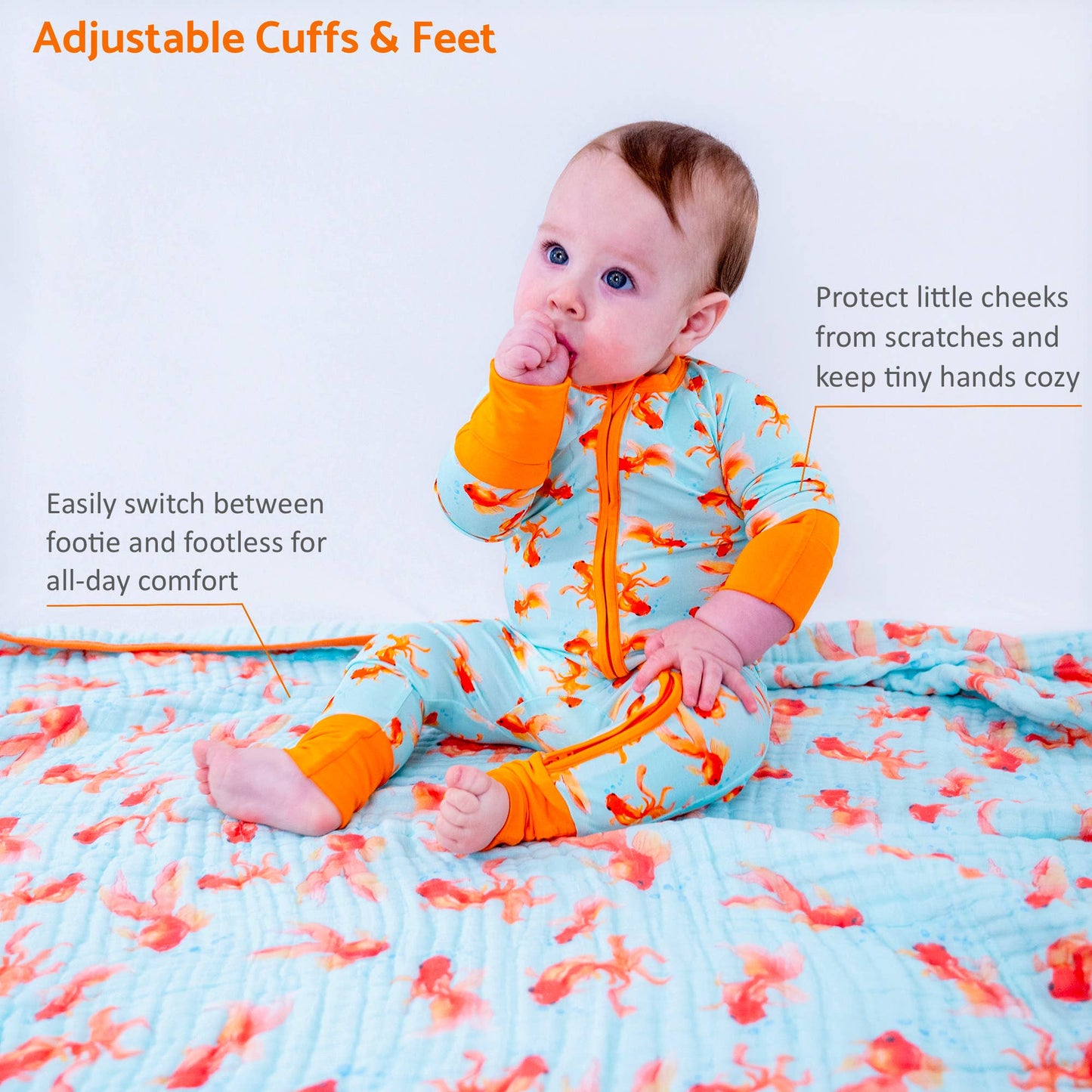 Baby in a colorful pajama onesie with adjustable cuffs and feet, sitting on a textured blanket.