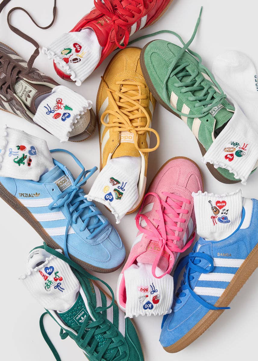 Colorful sneakers with unique designs on white background