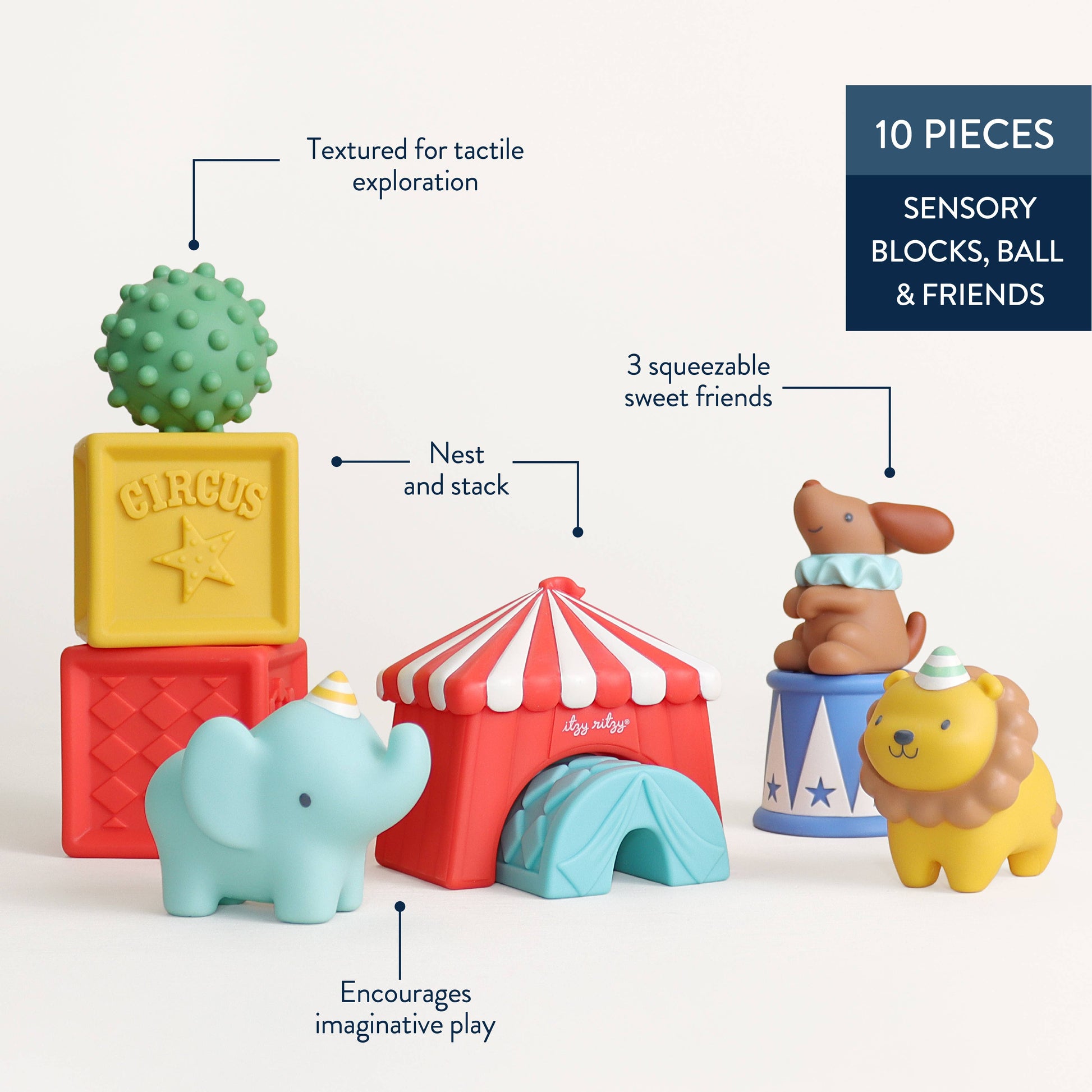 A set of colorful sensory toy blocks and friends arranged on a light beige background with callout labels. The set includes a green bumpy ball on top of yellow and red circus blocks, a red-and-white striped circus tent, a light blue elephant, and a brown bear sitting on a blue-and-white circus cup next to a yellow lion.
