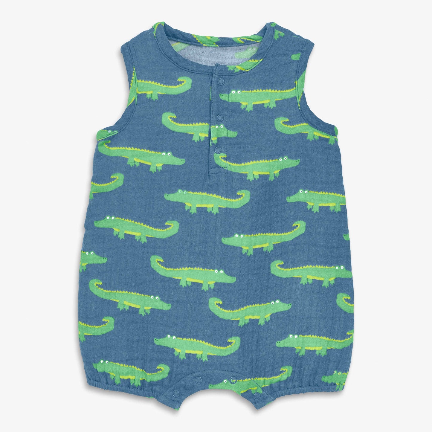 Blue romper with green alligator pattern on a white background