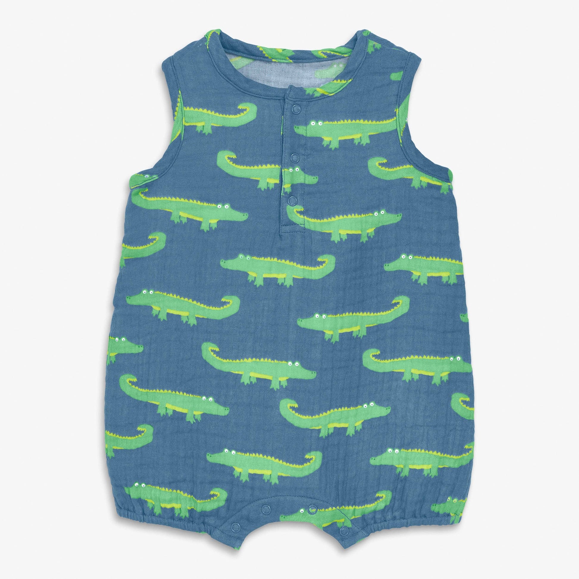Blue romper with green alligator pattern on a white background
