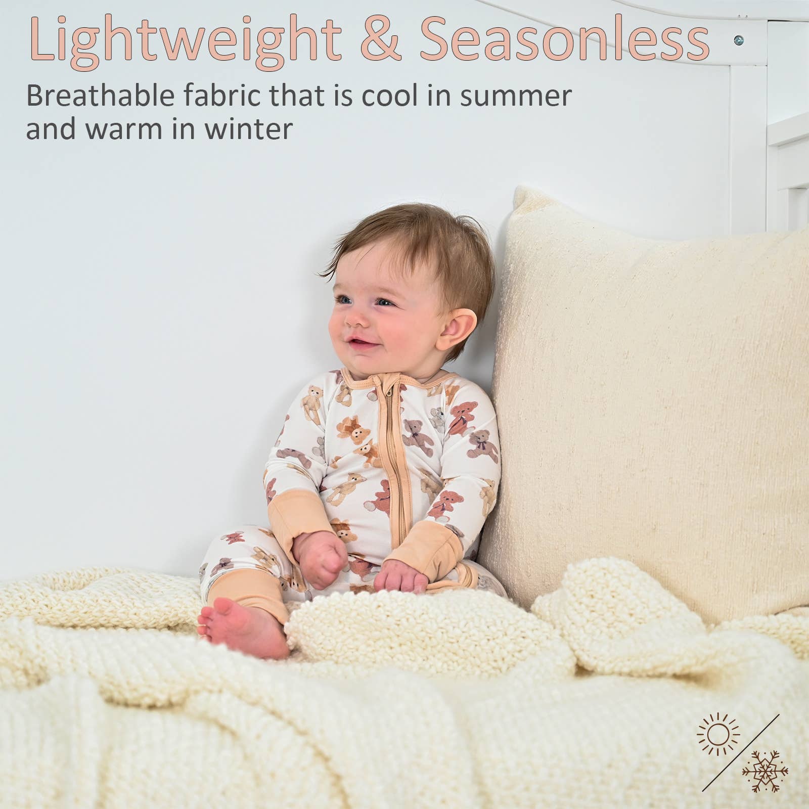Baby sitting on a bed wearing teddy bear pajamas with text about breathable fabric