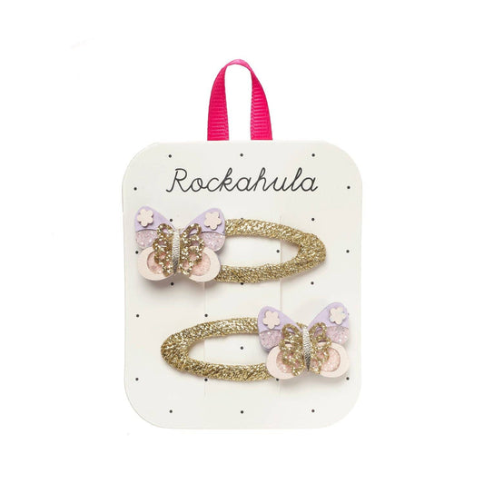 Set of butterfly-themed hair clips on a Rockahula branded card.