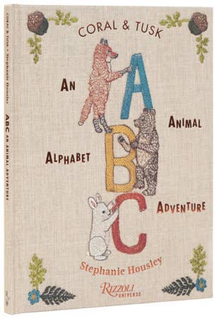 Book cover of 'Coral & Tusk: An Alphabet ABC Animal Adventure' by Stephanie Housley with illustrations of animals and letters.