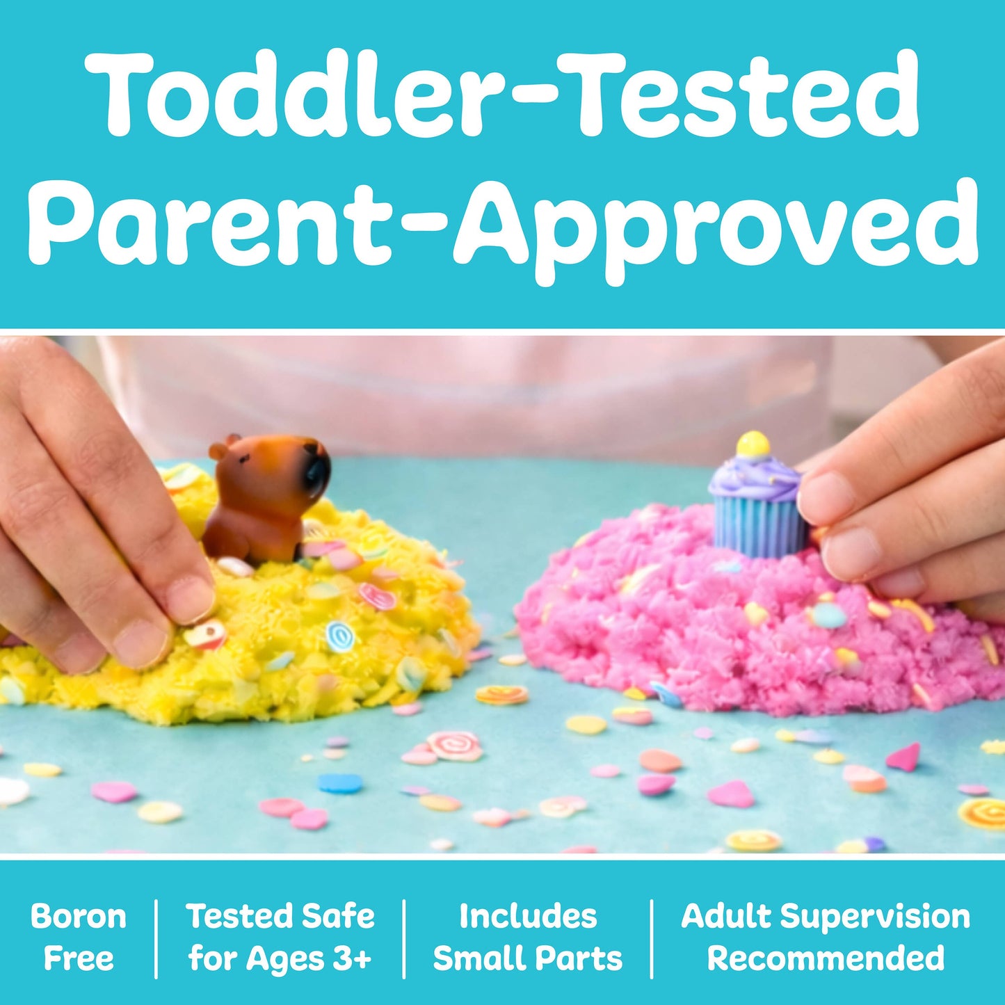 Two hands playing with colorful kinetic sand on a blue surface, with text indicating safety and supervision.