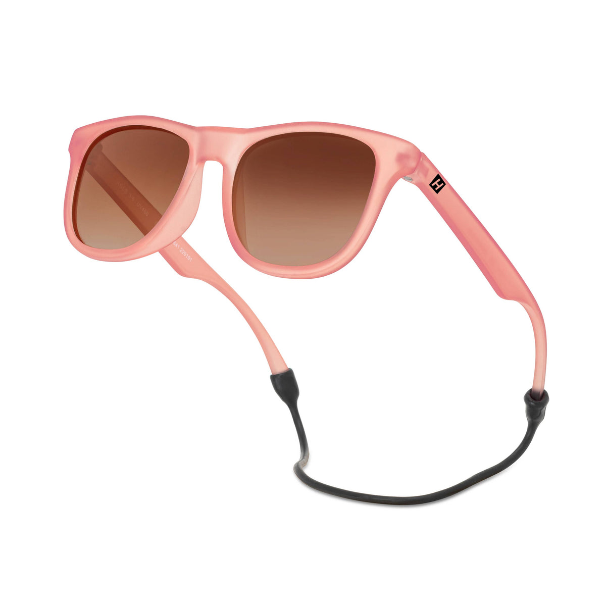 Pink sunglasses with a black strap on a white background