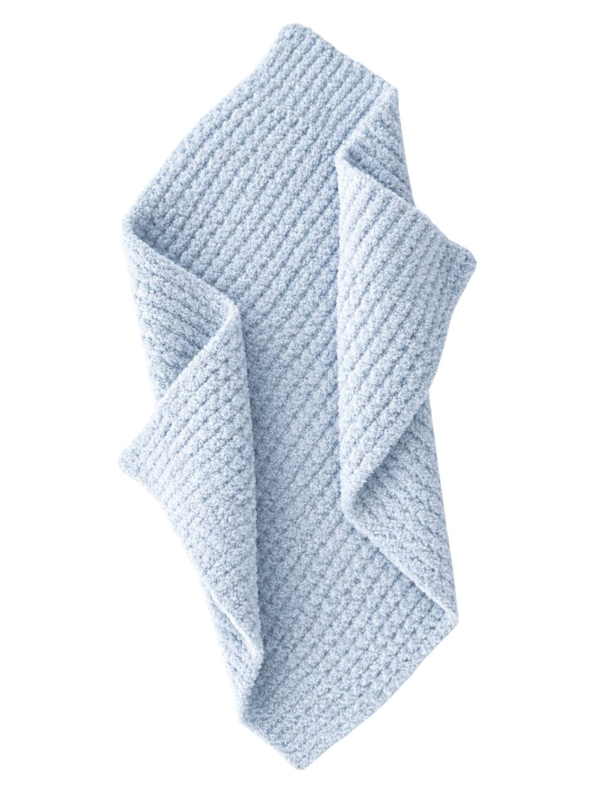 Light blue textured baby blanket on a white background