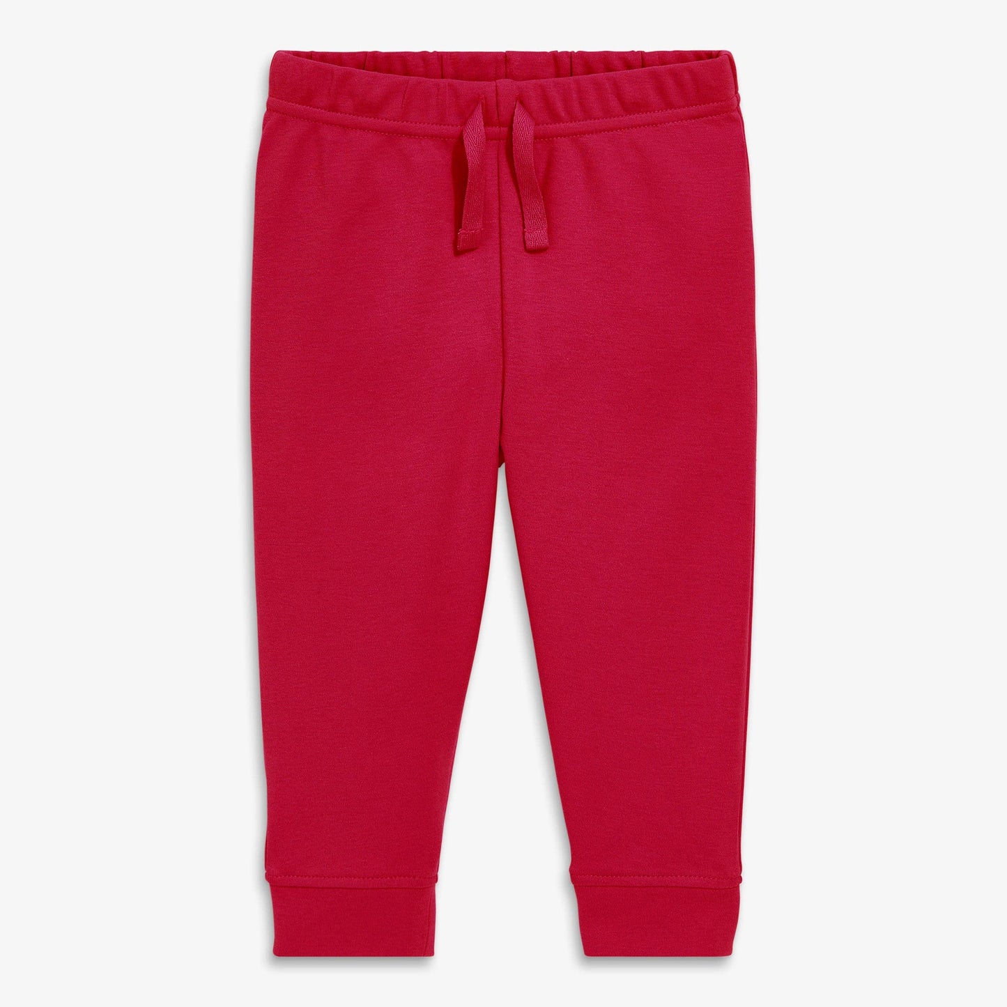 Red jogger pants with a drawstring on a white background