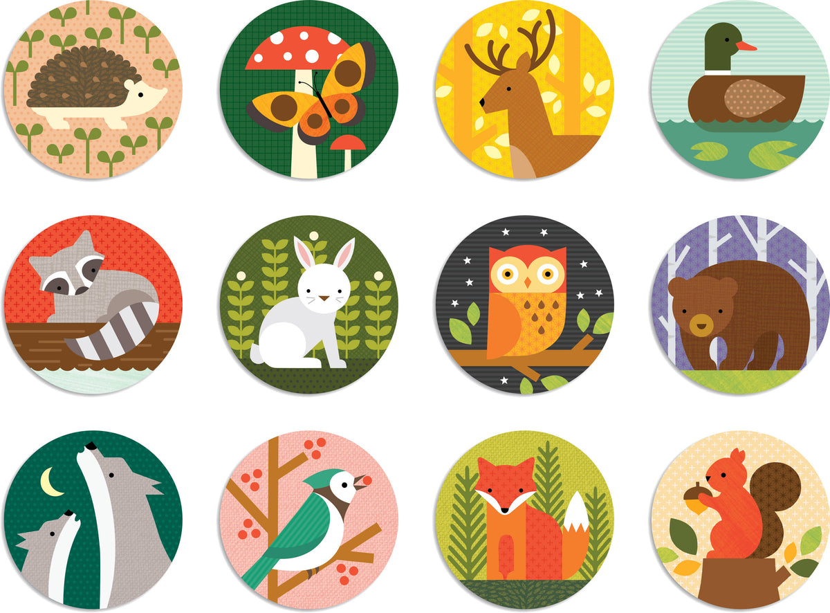 Set of round card tiles with various forest animals on a white background