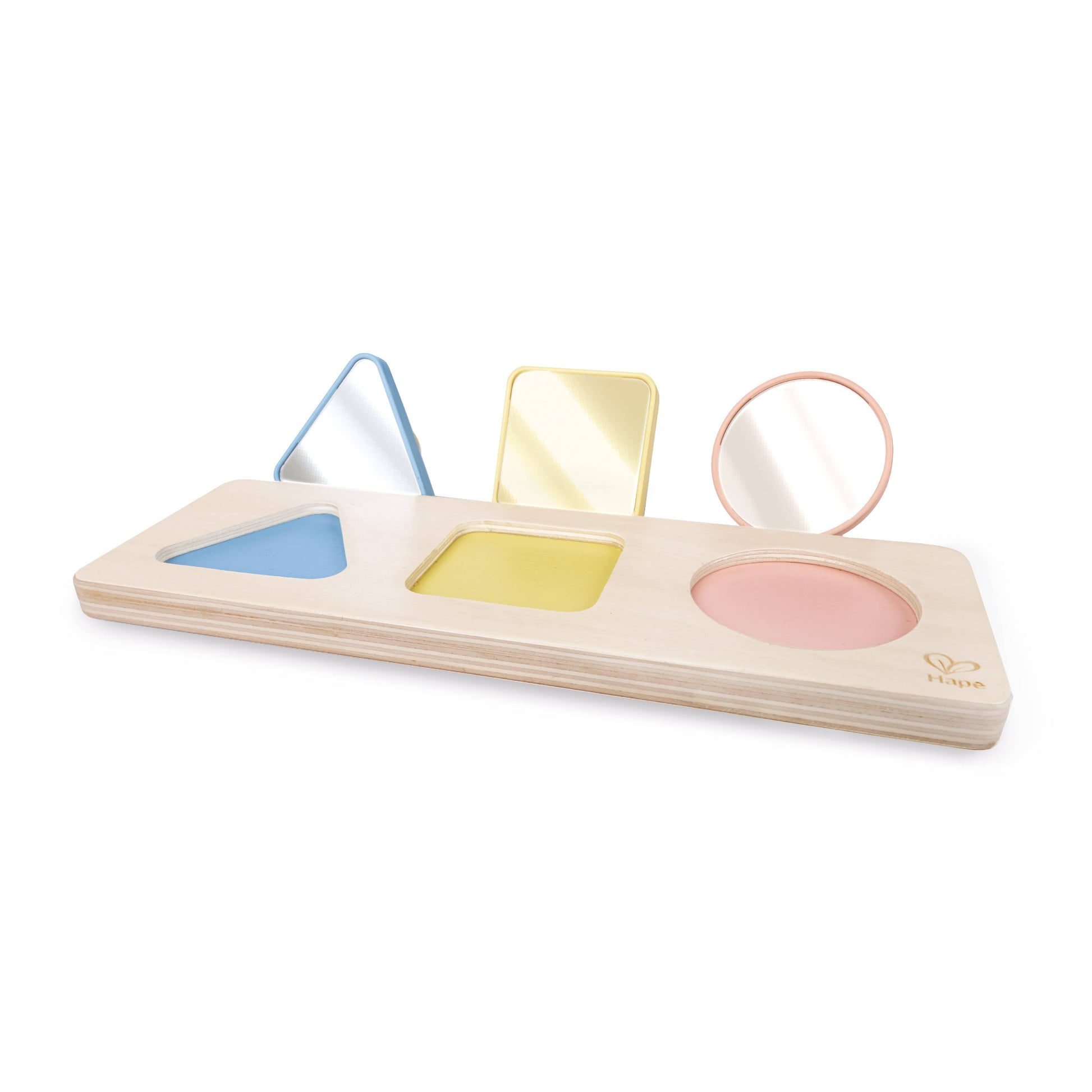 Wooden shape sorting toy with colorful shapes on a white background