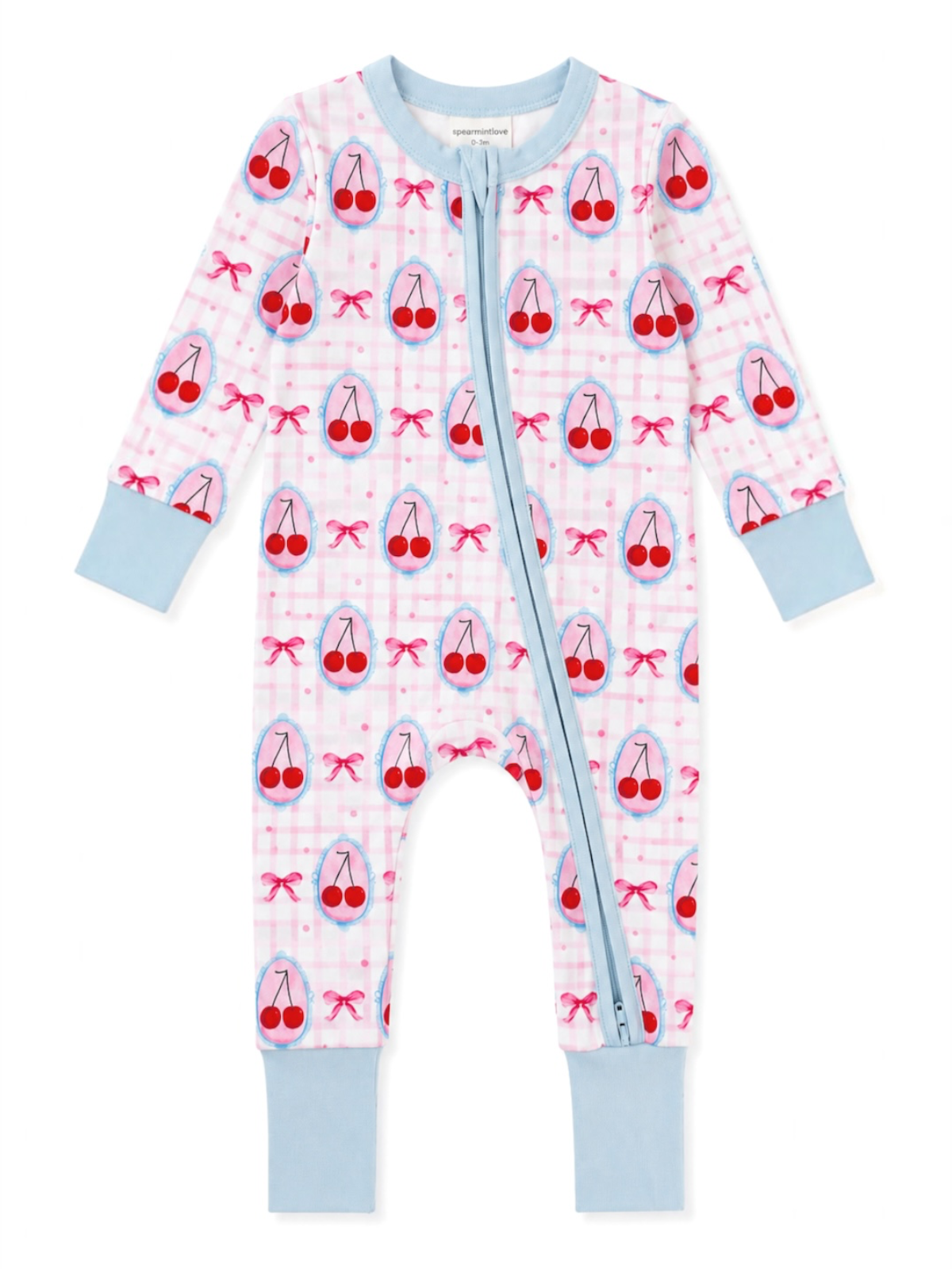A baby long-sleeve footless zip-up sleeper in a light pink and white gingham pattern, decorated with red cherries in blue ovals and pink bows. The sleeves, cuffs, and ankle cuffs are light blue, and there is a matching light blue zipper running down the front.