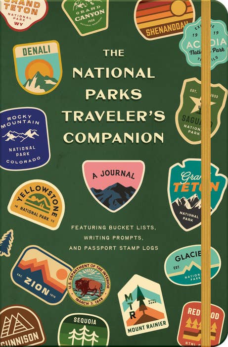 Journal titled 'The National Parks Traveler's Companion' with national park logos on a green background.