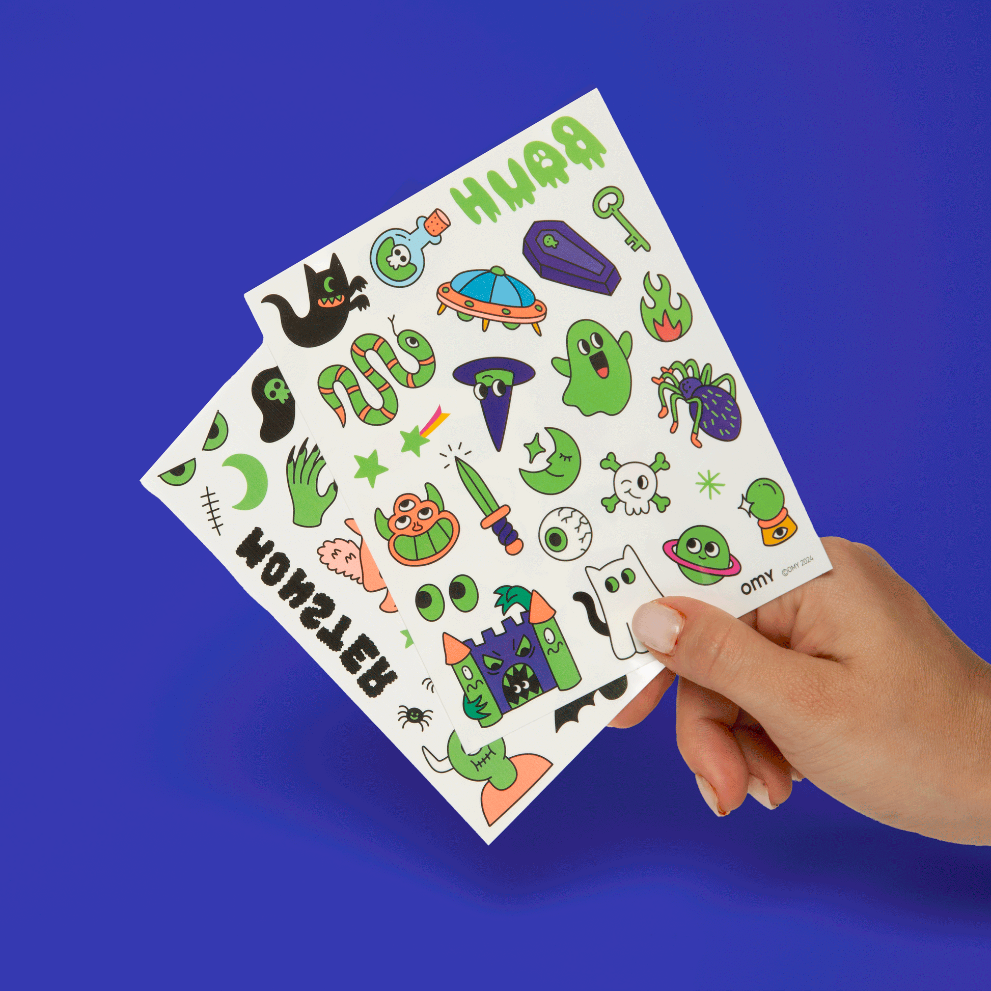 Flashing video showing sheets of temporary tattoos glowing in the dark.