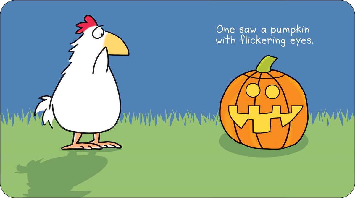 A chicken is standing in the grass looking at a jack o lantern.