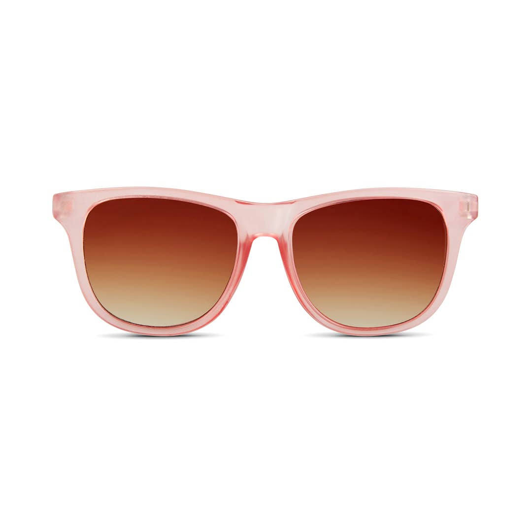 Pink sunglasses with brown gradient lenses on a white background