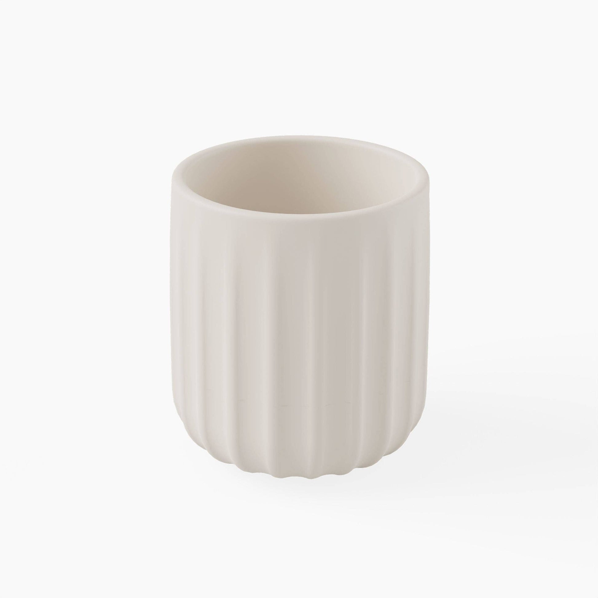 White silicone cup with textured design on a white background