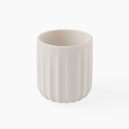 White silicone cup with textured design on a white background