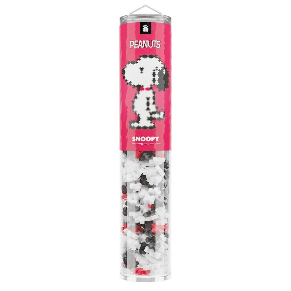 Tub of Snoopy-themed puzzle pieces with pink label on a white background