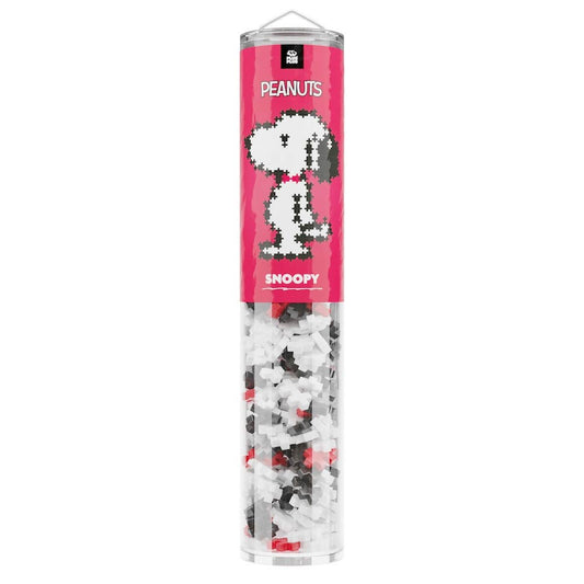 Tub of Snoopy-themed puzzle pieces with pink label on a white background