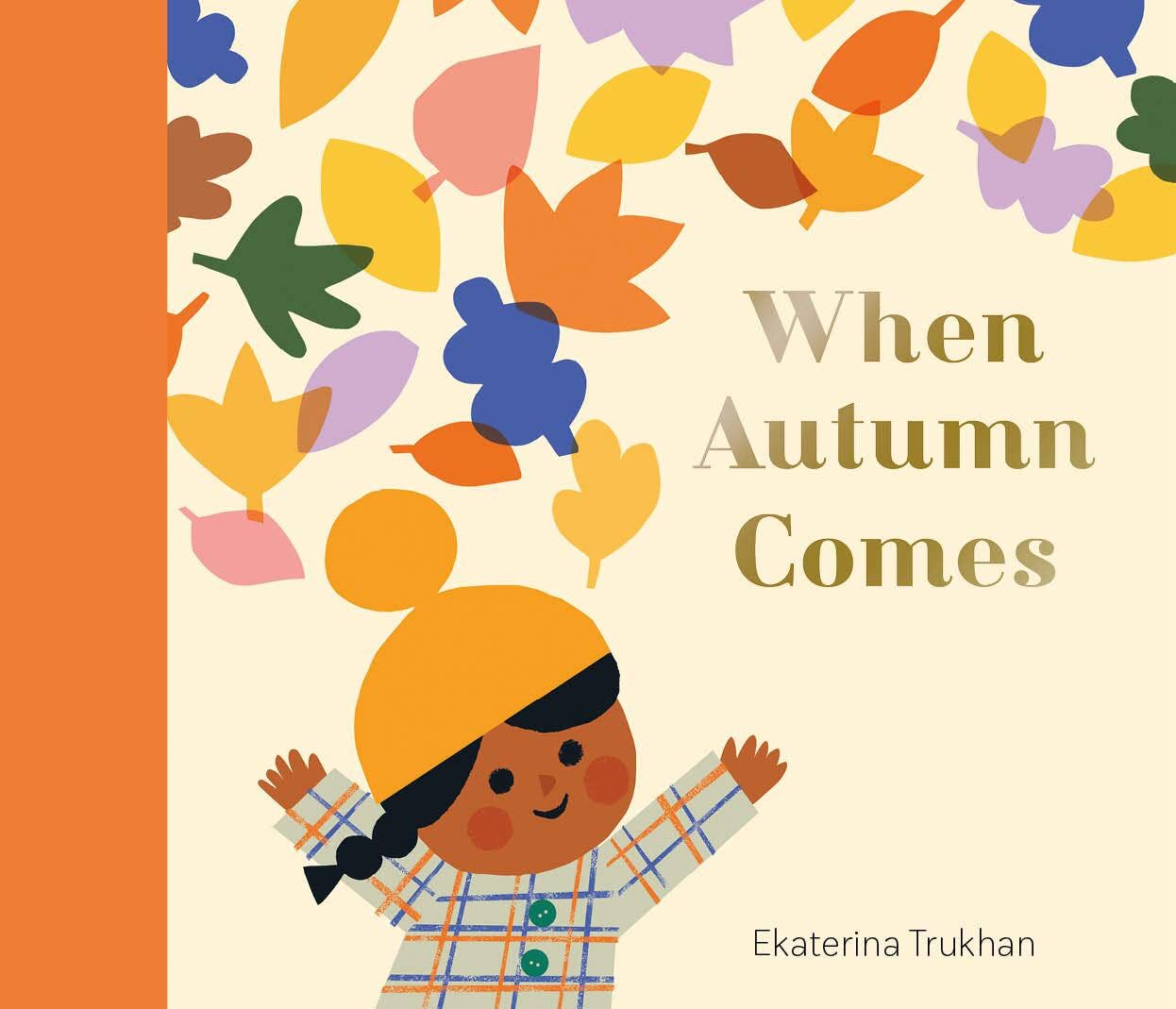 Book cover of 'When Autumn Comes' with a child and autumn leaves.