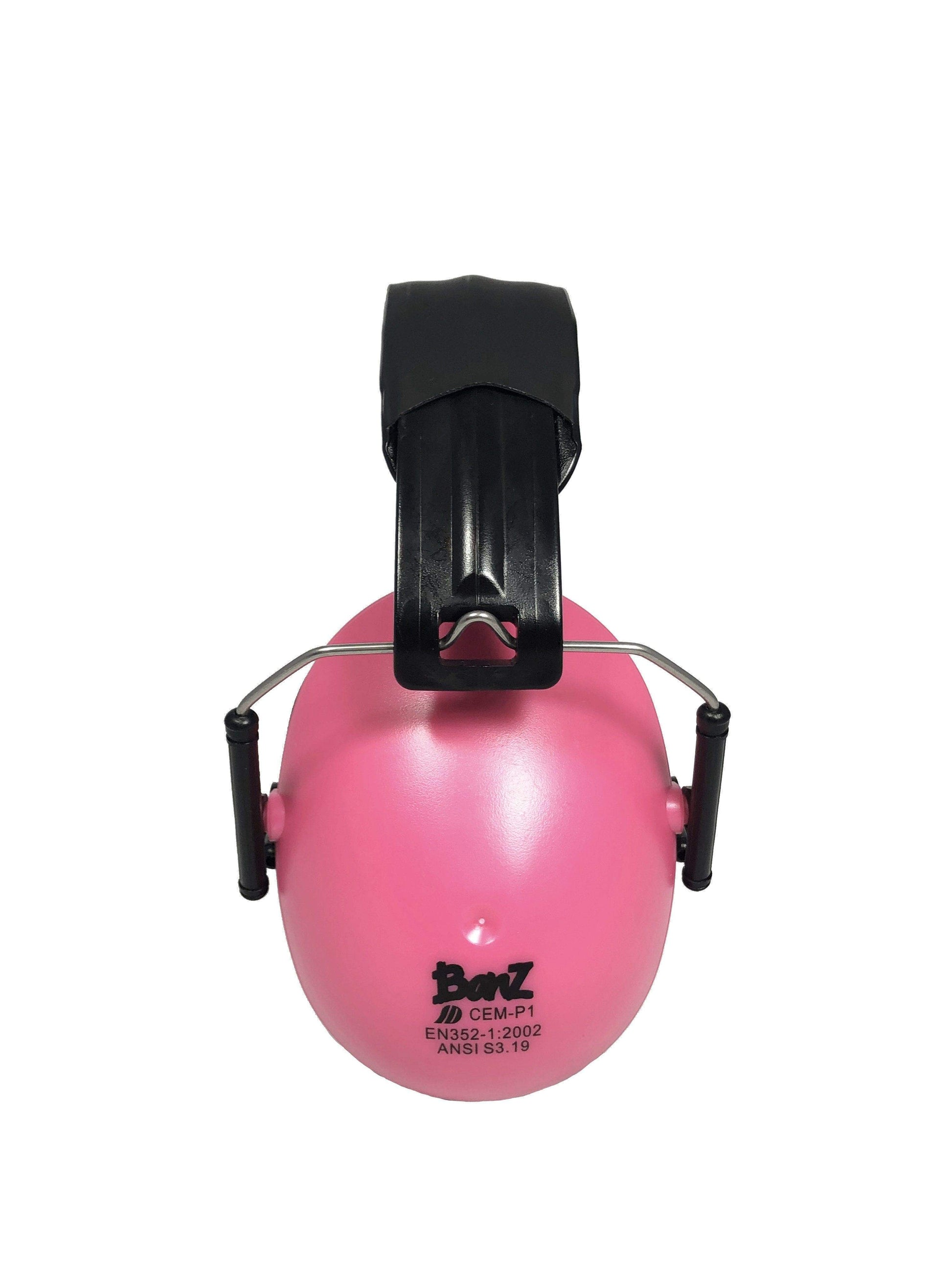Pink ear protection with a black clip on a white background
