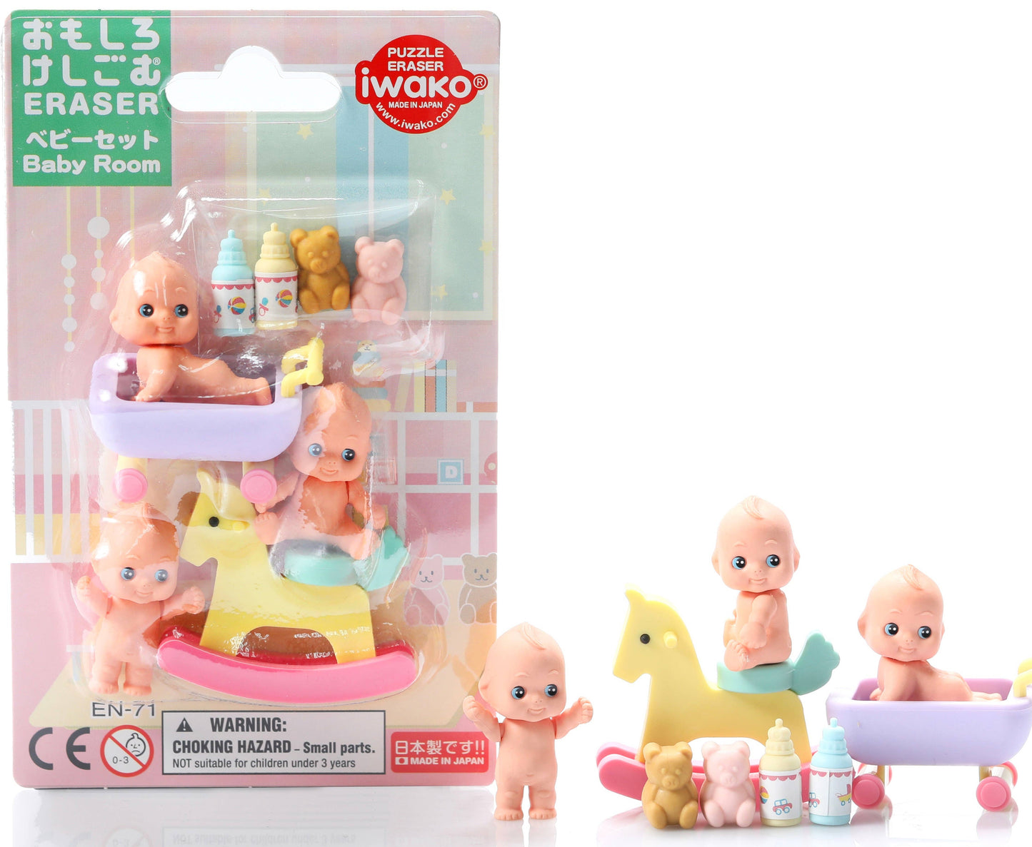 Packaged set of miniature baby eraser figures with accessories, including a crib and toys, on a white background.