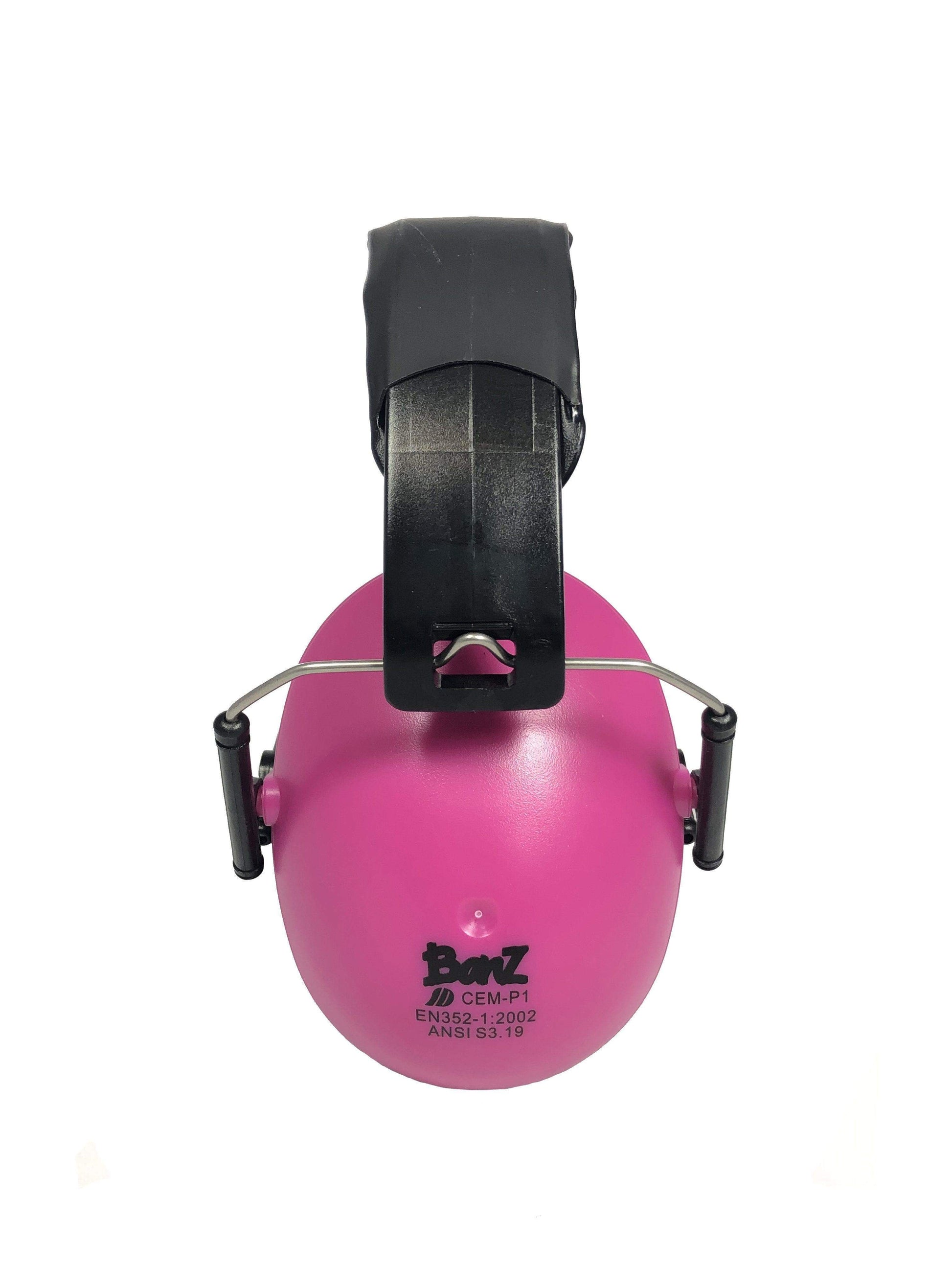 Pink ear protection with black clip on a white background