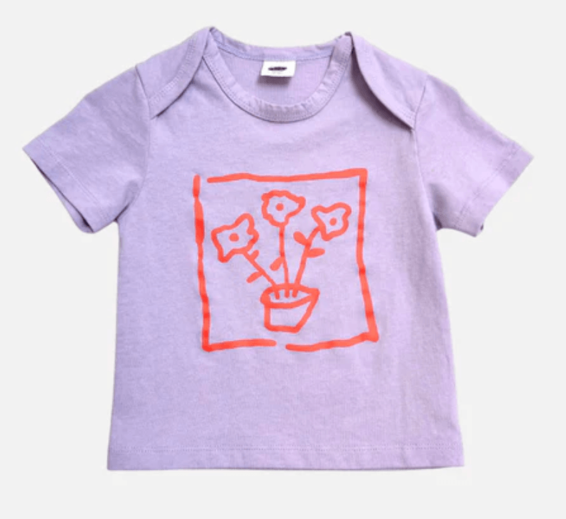 Lavender t-shirt with a red floral design on a white background