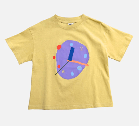 Yellow t-shirt with a colorful clock design on a white background