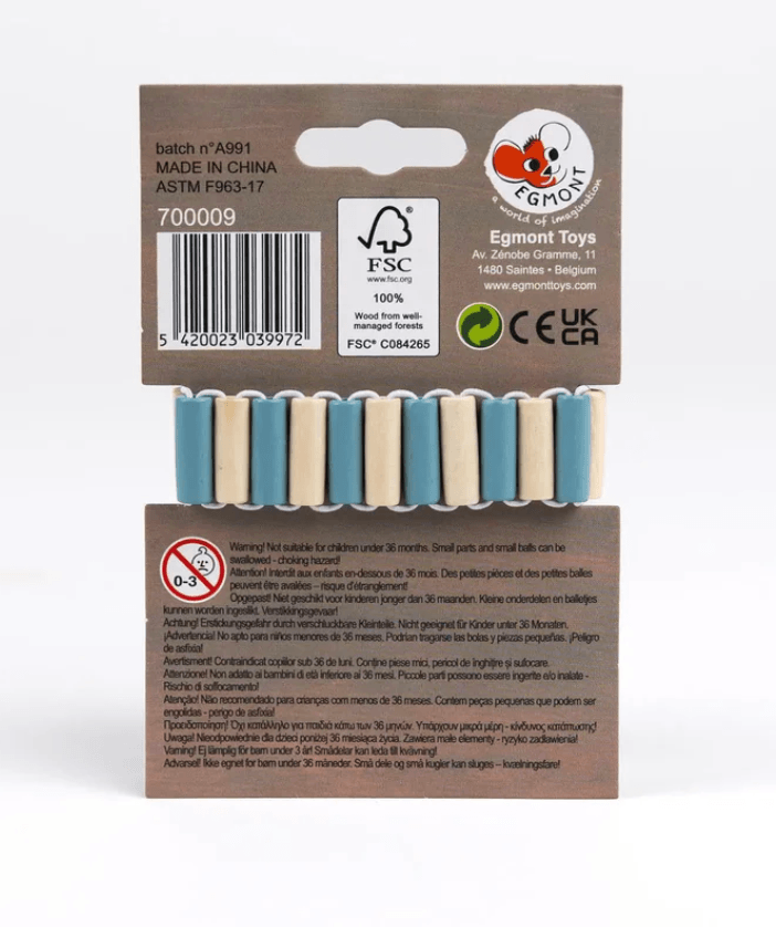 A package of Cogent Toys wooden toy beads, showing the top and bottom brown cardboard backing with product details, barcodes, and safety certifications. The beads inside are light natural wood with blue and yellow painted ends.