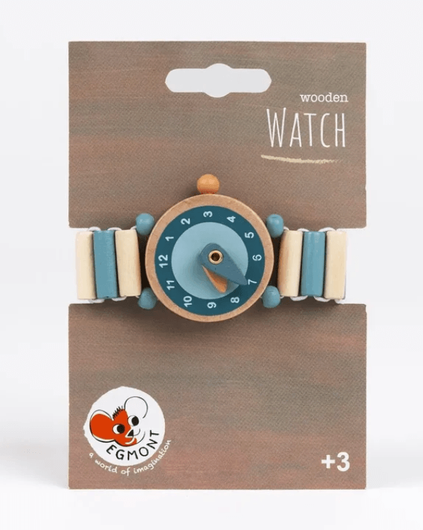 A wooden toy watch by Egmont on its original brown cardboard packaging. The watch features a round light wood case with a blue dial, a blue and cream striped wooden link band, and small wooden beads.