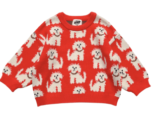 Child's sweater with an all over design of white dogs on red background
