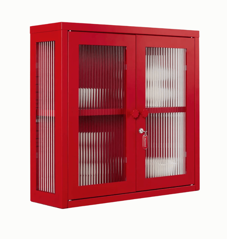 A red metal wall-mounted cabinet with two ribbed glass doors and side panels, shown on a plain white background.