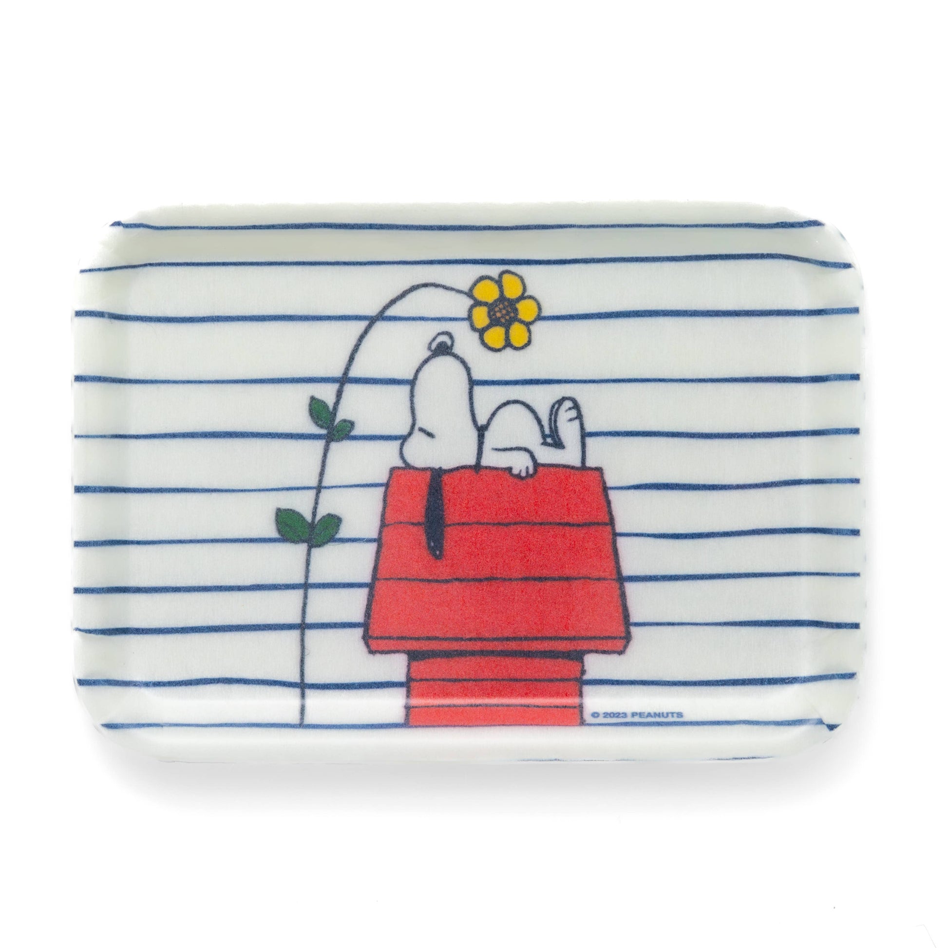Striped fiberglass tray with a cartoon design of a doghouse and a flower, featuring Snoopy from Peanuts.