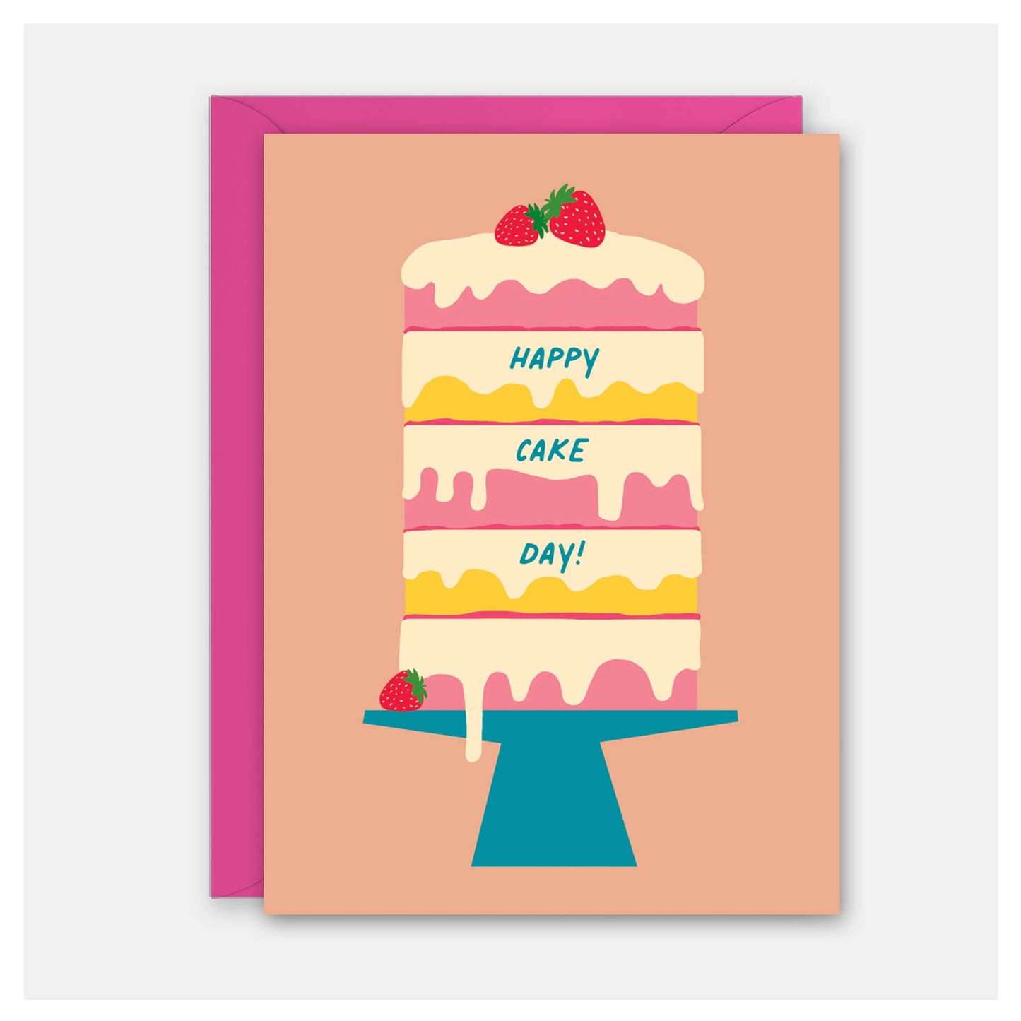 A greeting card featuring a colorful illustration of a four-tier cake on a stand with the words 'HAPPY CAKE DAY!' and strawberries, shown with a bright pink envelope behind it on a light gray background.