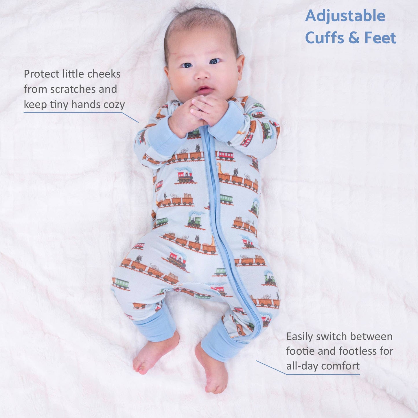 A baby lying on a white textured blanket wearing a light blue footless sleep sack with a train pattern and adjustable cuffs. Text overlays describe the features of the sleep sack.