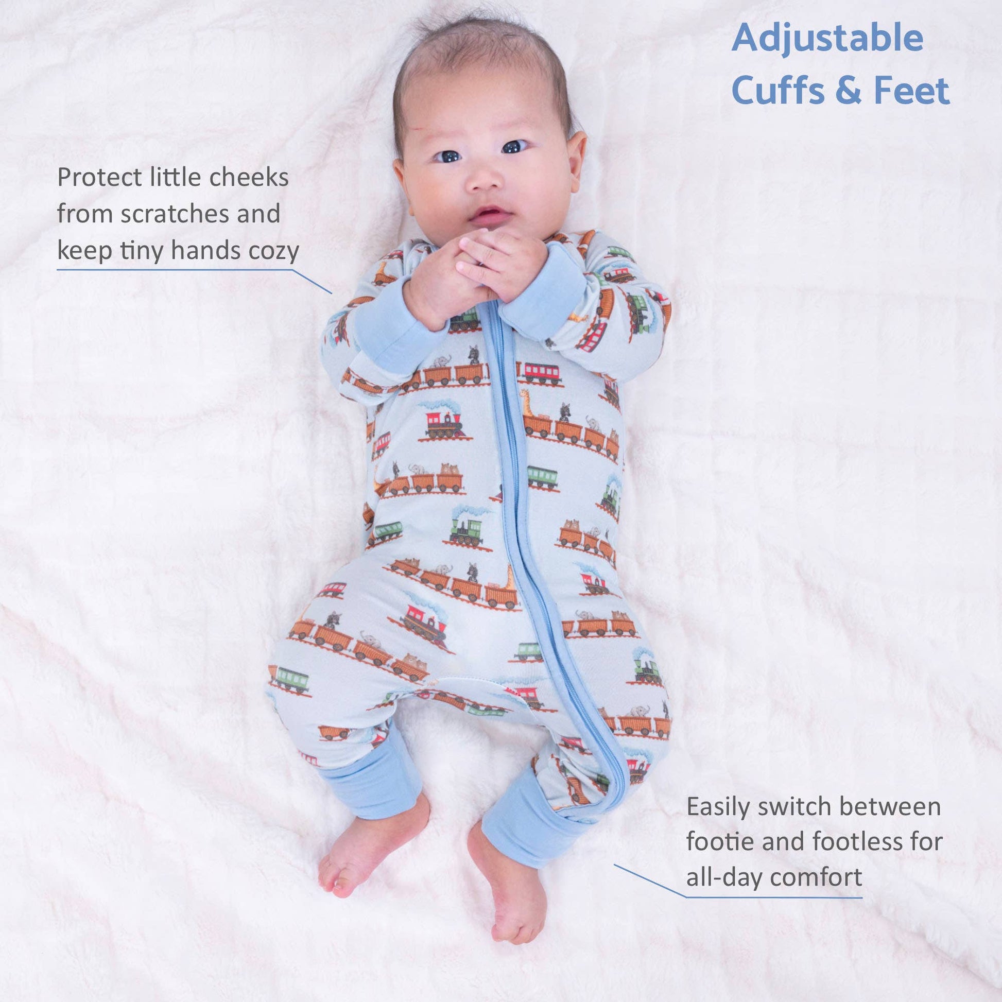 A baby lying on a white textured blanket wearing a light blue footless sleep sack with a train pattern and adjustable cuffs. Text overlays describe the features of the sleep sack.